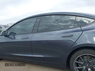2022 Tesla Model 3 Long Range with VIN 5YJ3E1EB9NF164774, listed as a IAAI auction lot 41915755 with 39,625 mi miles and . Bid and sale history available at DreamBid. Image 14.