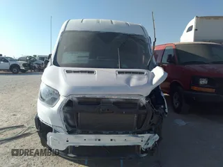 2024 Ford Transit Cargo with VIN 1FTBR1C82RKA26803, listed as a IAAI auction lot 40440250 with 1,197 mi miles and . Bid and sale history available at DreamBid. Image 12.