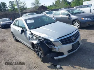 2013 Cadillac ATS z VIN 1G6AG5RX3D0175154, wystawiony jako IAAI lot #42345203 z przebiegiem 150 878 mil mil oraz . Historia ofert i sprzedaży dostępna na DreamBid. Obrazek 1.