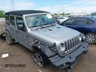 2021 Jeep Wrangler Unlimited Sport S z VIN 1C4HJXDGXMW523092, wystawiony jako IAAI lot #42214857 z przebiegiem 76 169 mil mil oraz . Historia ofert i sprzedaży dostępna na DreamBid. Obrazek 1.