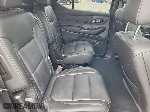 2023 Chevrolet Traverse LT z VIN 1GNEVHKW5PJ325679, wystawiony jako IAAI lot #42541394 z przebiegiem 74 480 mil mil oraz . Historia ofert i sprzedaży dostępna na DreamBid. Obrazek 7.