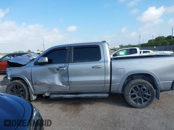 2019 Ram 1500 Big Horn z VIN 1C6RREFT0KN785936, wystawiony jako IAAI lot #41724260 z przebiegiem 71 247 mil mil oraz . Historia ofert i sprzedaży dostępna na DreamBid. Obrazek 13.