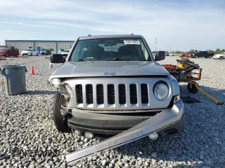 2014 Jeep Patriot Latitude with VIN 1C4NJRFB9ED759908, listed as a Copart auction lot 63874905 with 61,960 mi miles and Salvage title. Bid and sale history available at DreamBid. Image 5.