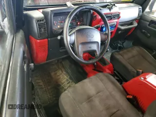 2004 Jeep Wrangler Sport with VIN 1J4FA49S64P722986, listed as a Copart auction lot 51840985 with 129,761 mi miles and Clean Title. Bid and sale history available at carsss.com. Image 8.