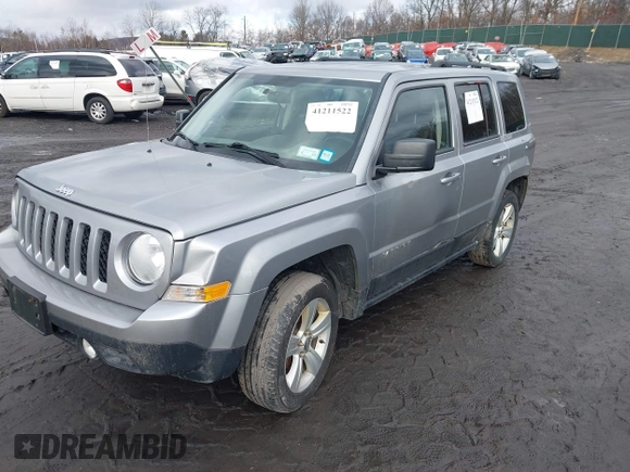 2014 Jeep Patriot Latitude with VIN 1C4NJRFB6ED778433, listed as a IAAI auction lot 41211522 with 127,506 mi miles. Bid and sale history available at carsss.com. Image 2.