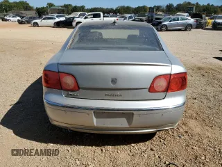 2004 Volkswagen Phaeton V8 z VIN WVWAF63D748010147, wystawiony jako Copart lot #75843654 z przebiegiem 147 157 mil mil oraz Nie do naprawy. Historia ofert i sprzedaży dostępna na DreamBid. Obrazek 6.