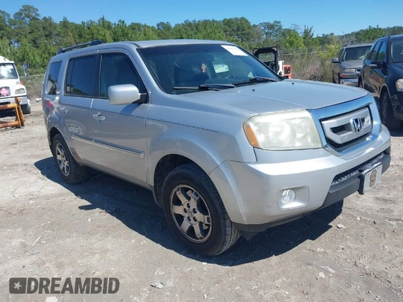 2011 Honda Pilot Touring with VIN 5FNYF4H91BB086712, listed as a IAAI auction lot 41809369 with 260,718 mi miles. Bid and sale history available at carsss.com. Image 1.