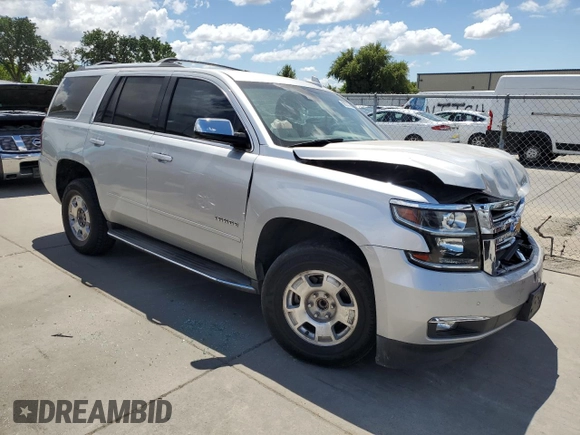 2017 Chevrolet Tahoe Premier with VIN 1GNSCCKC5HR212660, listed as a Copart auction lot 56337065 with 135,989 mi miles and Salvage title. Bid and sale history available at DreamBid. Image 4.