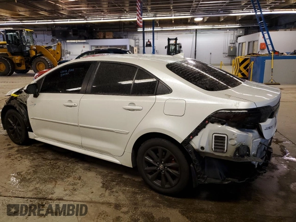 2023 Toyota Corolla Hybrid LE with VIN JTDBCMFE0PJ005942, listed as a Copart auction lot 45211345 with 30,004 mi miles and Salvage Title. Bid and sale history available at carsss.com. Image 2.