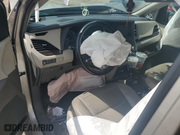 2016 Toyota Sienna XLE with VIN 5TDYK3DC0GS697468, listed as a Copart auction lot 51186795 with 128,851 mi miles and Salvage Title. Bid and sale history available at DreamBid. Image 8.