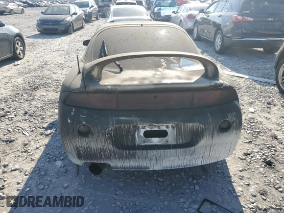 1998 Mitsubishi Eclipse GS-T with VIN 4A3AK54F8WE087052, listed as a Copart auction lot 77439464 with 119,881 mi miles and Salvage Title. Bid and sale history available at carsss.com. Image 6.