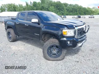 2016 GMC Canyon 4WD SLT z VIN 1GTG6DE39G1133836, wystawiony jako IAAI lot #42243925 z przebiegiem 149 147 mil mil oraz . Historia ofert i sprzedaży dostępna na DreamBid. Obrazek 1.