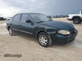 2000 Hyundai Elantra GLS z VIN KMHJF35F3YU002102, wystawiony jako Copart lot #73243004 z przebiegiem 79 155 mil mil oraz Szkoda całkowita • Salvage title. Historia ofert i sprzedaży dostępna na DreamBid. Obrazek 4.