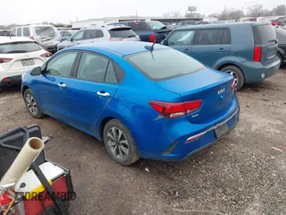 2022 Kia Rio S with VIN 3KPA24AD0NE458613, listed as a IAAI auction lot 41646100 with 106,859 mi miles and . Bid and sale history available at carsss.com. Image 3.