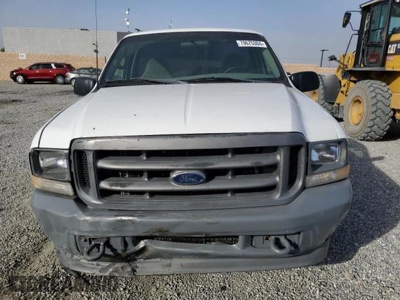 2002 Ford Super Duty F-250 XL with VIN 1FTNF20L52ED47162, listed as a Copart auction lot 79675304 with 216,687 mi miles and Salvage Title. Bid and sale history available at carsss.com. Image 5.