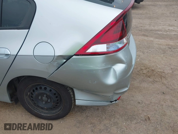 2012 Honda Insight LX with VIN JHMZE2H51CS002447, listed as a IAAI auction lot 42353583 with 179,377 mi miles and . Bid and sale history available at DreamBid. Image 6.
