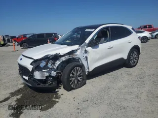 2020 Ford Escape Titanium Hybrid with VIN 1FMCU9DZ6LUC47658, listed as a Copart auction lot 59599995 with Not provided miles and Salvage title. Bid and sale history available at DreamBid. Image 1.