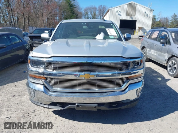 2018 Chevrolet Silverado 1500 LT with VIN 1GCVKREH4JZ323242, listed as a IAAI auction lot 41971945 with 63,915 mi miles and . Bid and sale history available at DreamBid. Image 12.