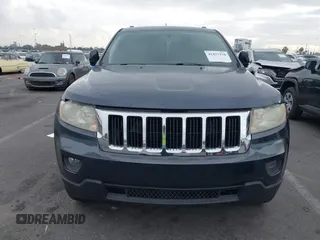 2013 Jeep Grand Cherokee Laredo with VIN 1C4RJEAGXDC620968, listed as a IAAI auction lot 41425270 with 127,739 mi miles. Bid and sale history available at carsss.com. Image 12.