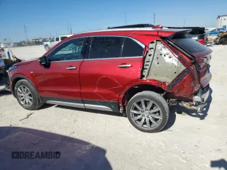 2022 Cadillac XT4 FWD Premium Luxury with VIN 1GYFZCR43NF154997, listed as a Copart auction lot 81942214 with 22,697 mi miles and Salvage title. Bid and sale history available at DreamBid. Image 2.