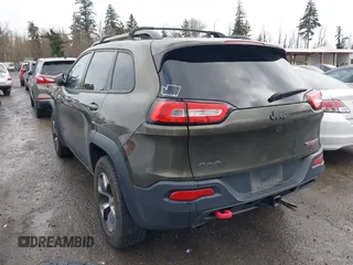 2015 Jeep Cherokee Trailhawk with VIN 1C4PJMBB5FW510514, listed as a IAAI auction lot 41492111 with 98,482 mi miles and . Bid and sale history available at DreamBid. Image 3.