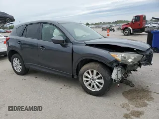 2014 Mazda CX-5 Touring z VIN JM3KE4CY2E0368729, wystawiony jako Copart lot #55563645 z przebiegiem 204 521 mil mil oraz Szkoda całkowita • Salvage title. Historia ofert i sprzedaży dostępna na DreamBid. Obrazek 4.