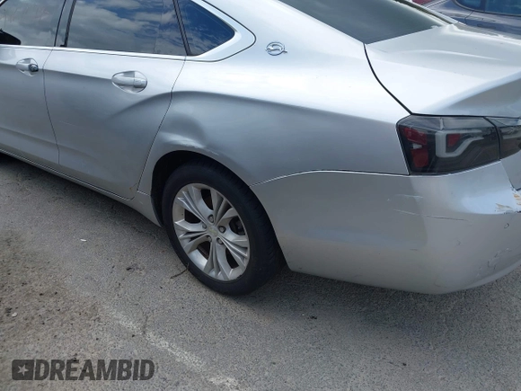2014 Chevrolet Impala LT with VIN 2G1115SL4E9279660, listed as a IAAI auction lot 42675495 with 159,215 mi miles and . Bid and sale history available at DreamBid. Image 21.