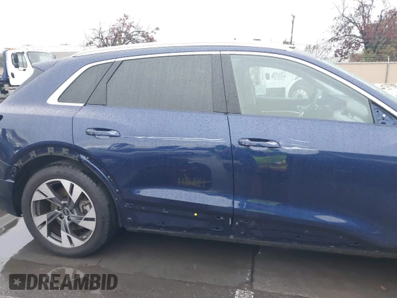 2022 Audi e-tron Premium Plus with VIN WA1LAAGE5NB022695, listed as a IAAI auction lot 41181338 with 14,711 mi miles and . Bid and sale history available at DreamBid. Image 6.