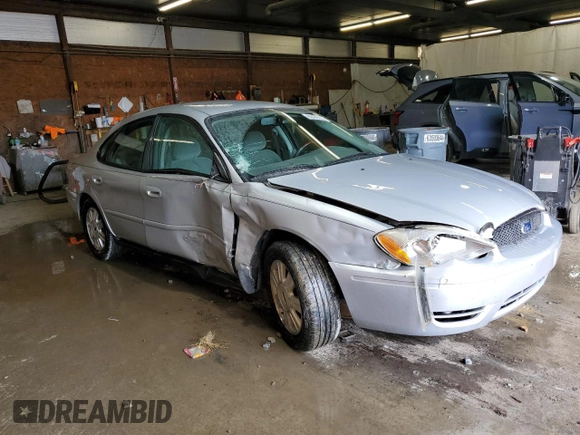 2006 Ford Taurus with VIN 1FAHP56U46A162809, listed as a Copart auction lot 60476125 with 95,542 mi miles and Salvage title. Bid and sale history available at DreamBid. Image 4.
