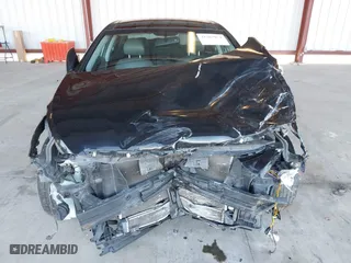 2013 Hyundai Sonata Hybrid with VIN KMHEC4A44DA064673, listed as a IAAI auction lot 41267954 with 178,562 mi miles. Bid and sale history available at carsss.com. Image 6.