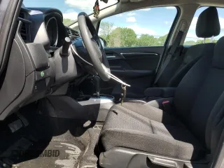 2020 Honda Fit LX z VIN 3HGGK5H42LM725762, wystawiony jako Copart lot #58353315 z przebiegiem 55 794 mil mil oraz Szkoda całkowita • Salvage title. Historia ofert i sprzedaży dostępna na DreamBid. Obrazek 7.