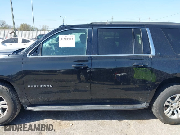 2019 Chevrolet Suburban LT with VIN 1GNSKHKC3KR285095, listed as a IAAI auction lot 41851014 with 151,075 mi miles and . Bid and sale history available at DreamBid. Image 14.