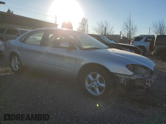 2000 Ford Taurus SE with VIN 1FAFP53U7YG259840, listed as a Copart auction lot 42412595 with 125,226 mi miles and Salvage Title. Bid and sale history available at DreamBid. Image 4.