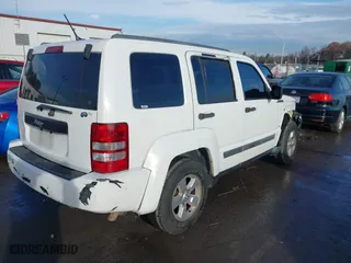 2011 Jeep Liberty Sport with VIN 1J4PP2GK7BW586705, listed as a IAAI auction lot 41110560 with 202,848 mi miles. Bid and sale history available at carsss.com. Image 4.