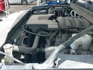 2018 Chevrolet Tahoe LT z VIN 1GNSCBKC9JR133640, wystawiony jako IAAI lot #42542381 z przebiegiem 130 154 mil mil oraz . Historia ofert i sprzedaży dostępna na DreamBid. Obrazek 19.