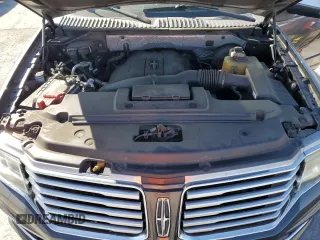 2015 Lincoln Navigator z VIN 5LMJJ3HT2FEJ12367, wystawiony jako Copart lot #56930865 z przebiegiem 71 415 mil mil oraz Szkody całkowita. Historia ofert i sprzedaży dostępna na DreamBid. Obrazek 12.