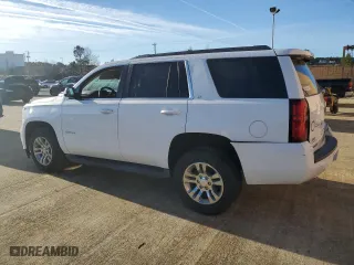2016 Chevrolet Tahoe LT with VIN 1GNSCBKC1GR311291, listed as a Copart auction lot 49956735 with 128,834 mi miles and Salvage Title. Bid and sale history available at carsss.com. Image 2.