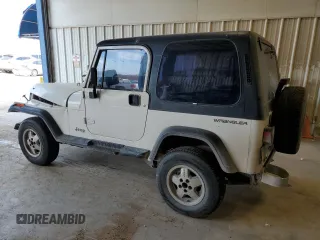 1995 Jeep Wrangler with VIN 1J4FY29SXSP309742, listed as a Copart auction lot 82399484 with 167,866 mi miles and Salvage Title. Bid and sale history available at carsss.com. Image 2.