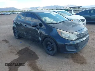2013 Kia Rio LX with VIN KNADM5A36D6301061, listed as a IAAI auction lot 42073447 with 194,274 mi miles. Bid and sale history available at carsss.com. Image 1.