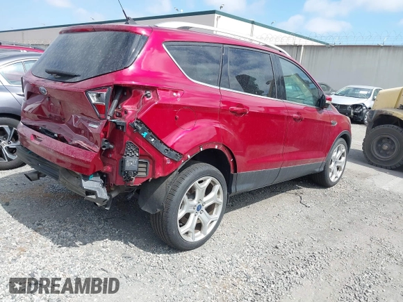 2019 Ford Escape Titanium with VIN 1FMCU0J96KUB79330, listed as a IAAI auction lot 42018346 with 35,500 mi miles and . Bid and sale history available at DreamBid. Image 4.