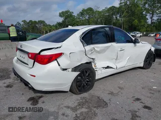 2015 Infiniti Q50 Premium z VIN JN1BV7AR5FM415612, wystawiony jako IAAI lot #41726943 z przebiegiem 120 534 mil mil oraz . Historia ofert i sprzedaży dostępna na DreamBid. Obrazek 6.
