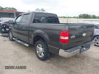 2006 Ford F-150 XLT with VIN 1FTRW12W96FA87318, listed as a IAAI auction lot 41936492 with 221,709 mi miles. Bid and sale history available at carsss.com. Image 3.