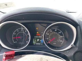 2015 Mitsubishi Outlander ES z VIN 4A4AP3AU0FE040621, wystawiony jako IAAI lot #41364883 z przebiegiem 187 454 mil mil oraz . Historia ofert i sprzedaży dostępna na DreamBid. Obrazek 7.