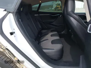 2016 Tesla Model S 70 kWh Battery with VIN 5YJSA1E15GF135841, listed as a IAAI auction lot 41846535 with 87,312 mi miles. Bid and sale history available at carsss.com. Image 8.