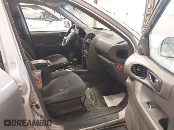 2003 Hyundai Santa Fe GLS with VIN KM8SC73D83U428723, listed as a IAAI auction lot 41305370 with 244,579 mi miles. Bid and sale history available at carsss.com. Image 5.