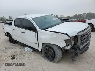 2022 GMC Canyon 4WD AT4 w/Cloth with VIN 1GTG6FEN8N1136558, listed as a Copart auction lot 82026324 with 68,281 mi miles and Salvage Title. Bid and sale history available at carsss.com. Image 4.