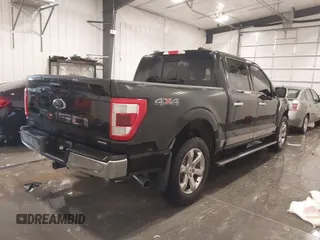 2021 Ford F-150 XL with VIN 1FTFW1E82MFB57285, listed as a IAAI auction lot 42073523 with 51,030 mi miles and . Bid and sale history available at DreamBid. Image 4.