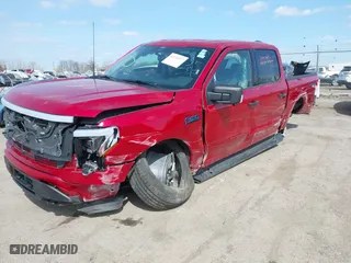 2024 Ford F-150 Lightning XLT with VIN 1FTVW3LK1RWG06162, listed as a IAAI auction lot 41930377 with 0 mi miles. Bid and sale history available at carsss.com. Image 2.