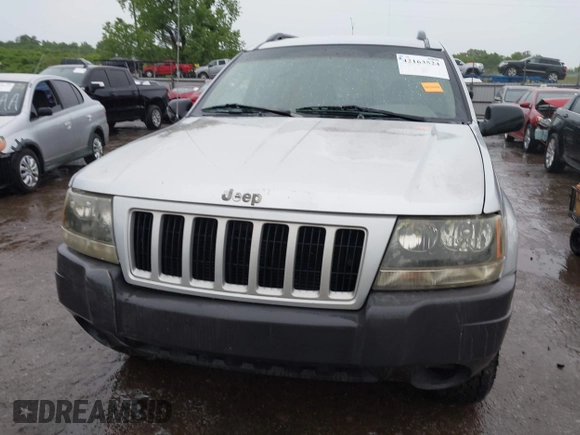 2004 Jeep Grand Cherokee Laredo z VIN 1J4GW48S64C132172, wystawiony jako IAAI lot #42163524 z przebiegiem 170 952 mil mil oraz . Historia ofert i sprzedaży dostępna na DreamBid. Obrazek 12.