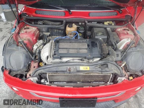 2005 MINI Convertible S с VIN WMWRH334X5TF82551, выставлен на аукционе Copart как лот 57983355 с пробегом 73 885 миль миль и Списание • Salvage title. История ставок и продаж доступна на DreamBid. Изображение 11.
